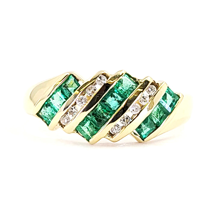 Curved Emerald and Diamond Ring