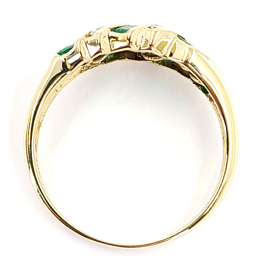 Curved Emerald and Diamond Ring